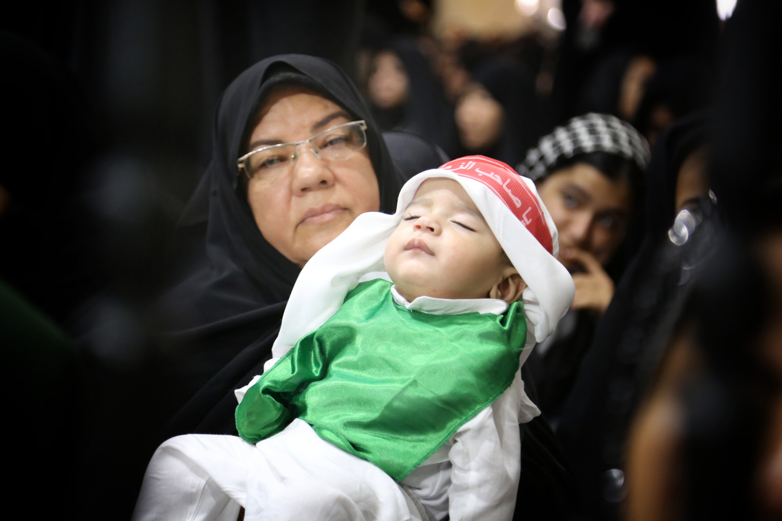 لباس حضرت علی اصغر(ع) بر تن کودکان شیرخوار قمی